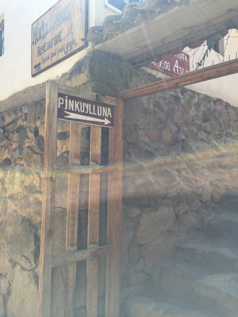 Sign to Pinkuylluna ruins in Ollantaytambo Peru