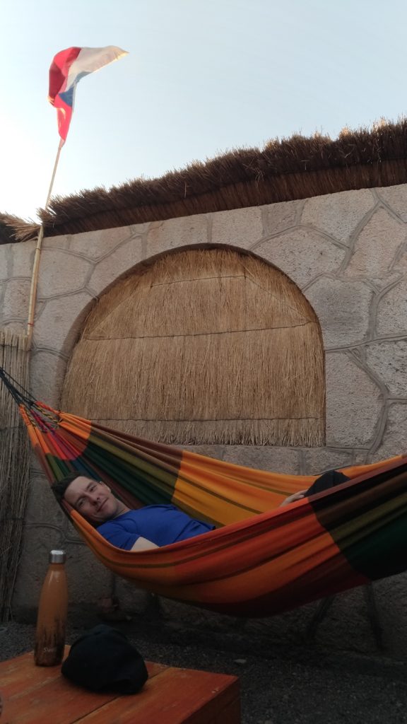 Relaxing on hammock at Hostal Desert San Pedro de Atacama