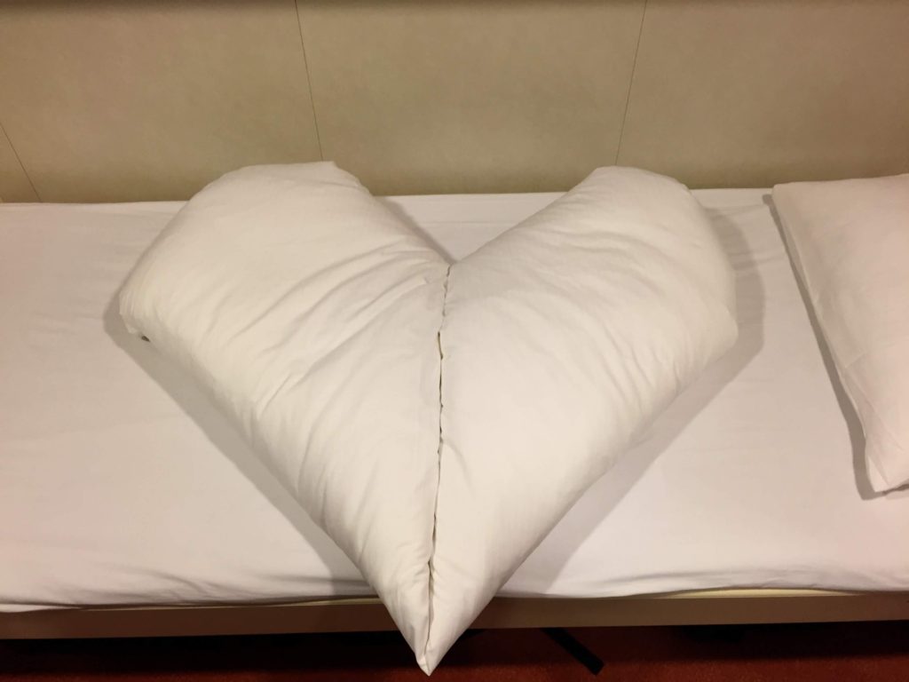 Bed sheets in heart on MS Midnatsol Cabin