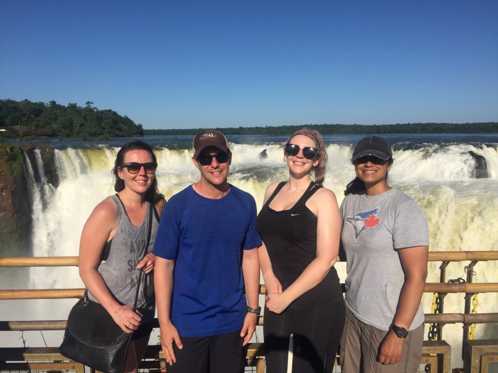 Group picture at the Devil's Throat Iguazu Falls