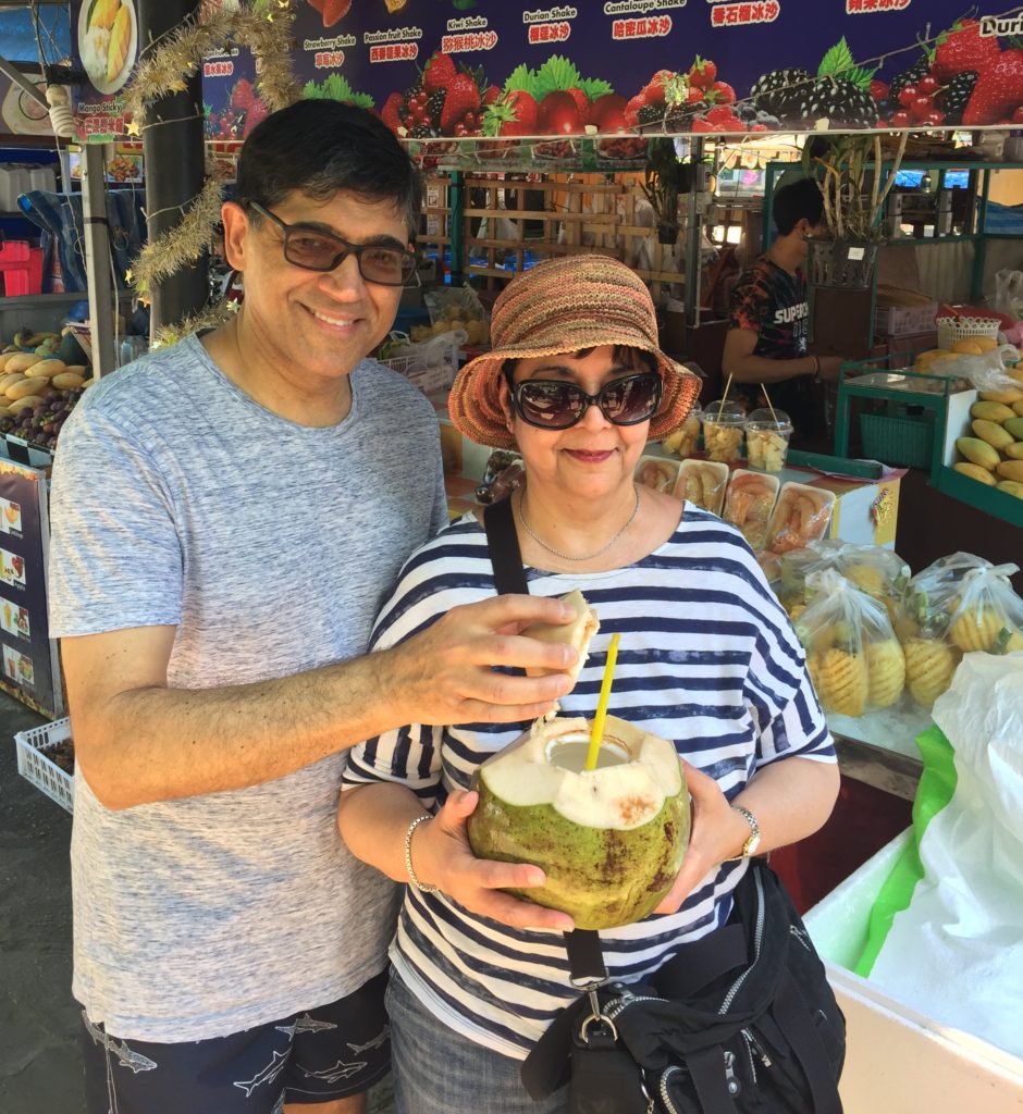 Firdos and Arzina Somji with coconut
