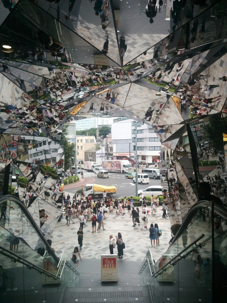 Tokyo mirrors on escalator