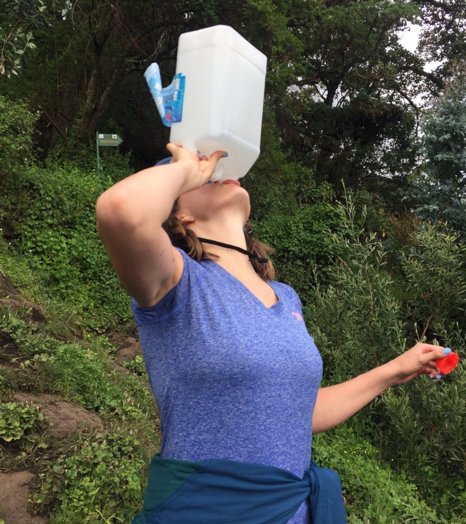 Drinking water on Mt. Bisoke Rwanda