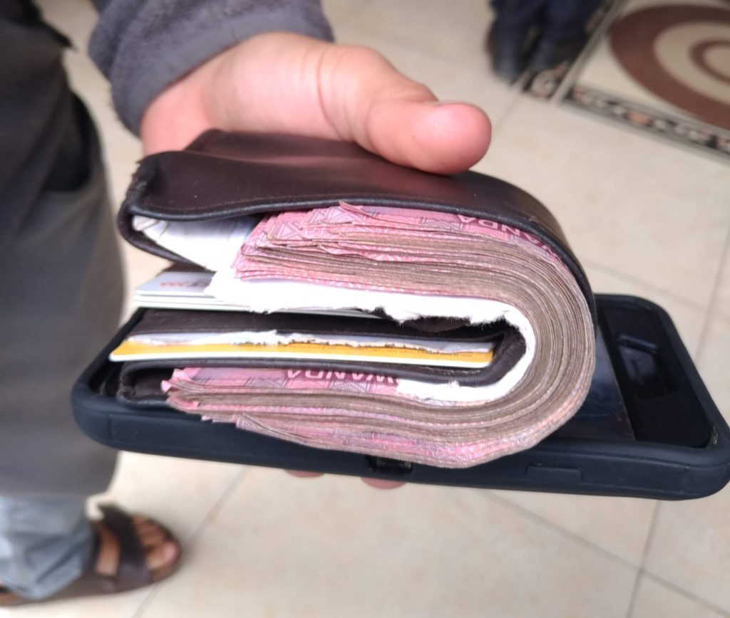 Wallet full of Rwandan Francs